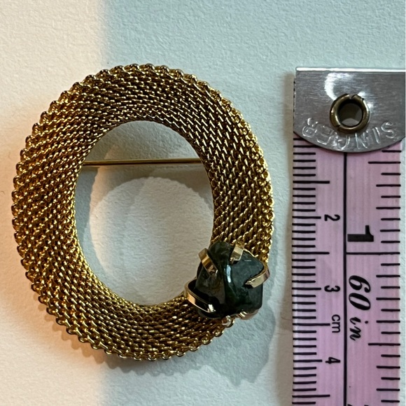 Vintage Gold Brooch with a Green stone